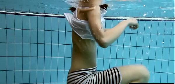  Vera Brass wet and horny in the swimming pool